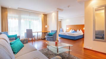 Junior Suite | Living area | Flat-screen TV