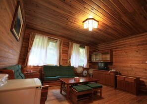 Quarto, banheira, vista para a colina (Guest) | Sala de estar | TV de tela plana