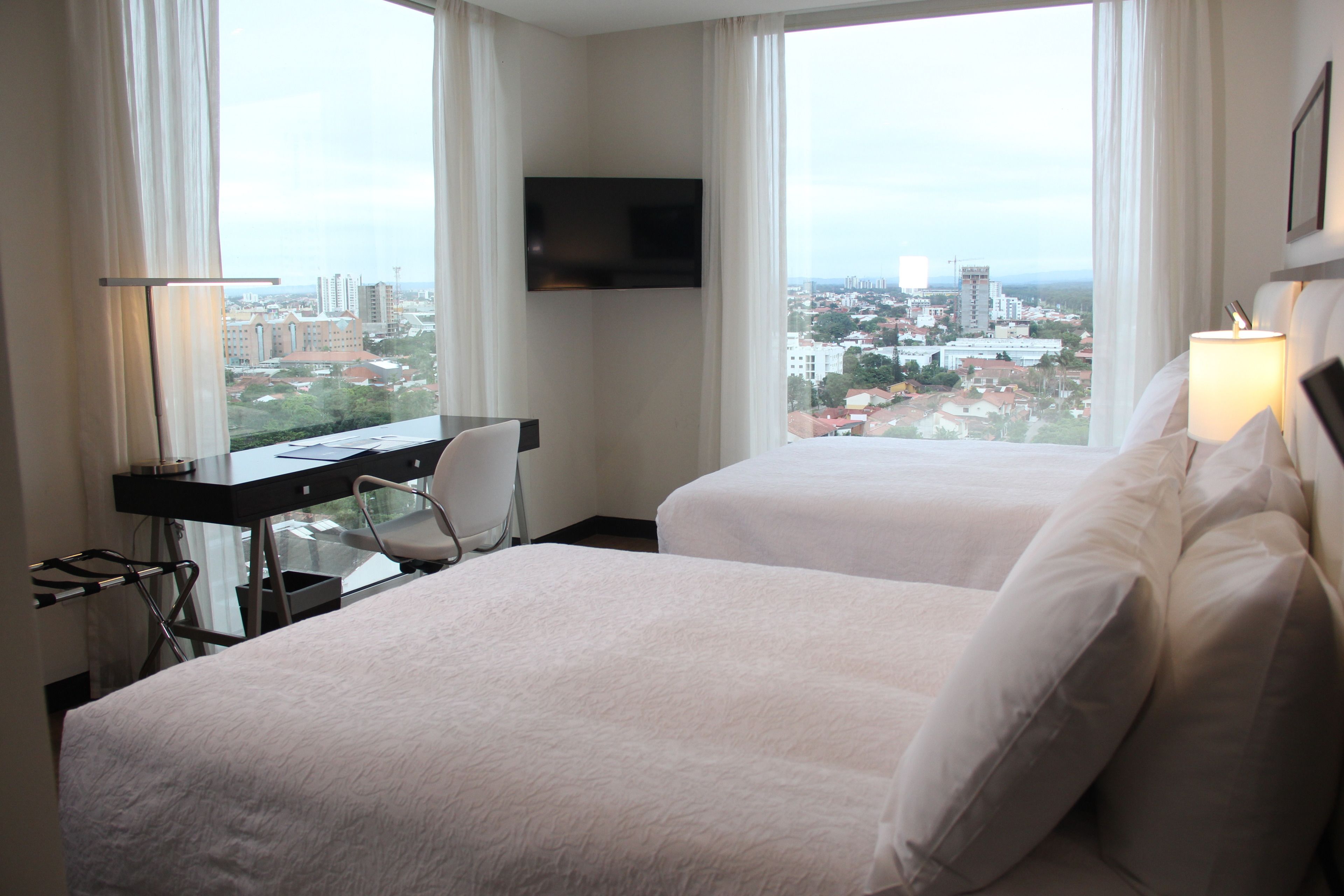 room, multiple beds | in-room safe, blackout curtains, iron/ironing board