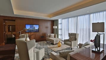 Presidential Suite, 1 Twin Bed | Living area | 48-inch Smart TV with cable channels, TV, iPod dock