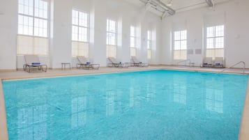 Indoor pool, open 8:00 AM to 10:00 PM, pool loungers