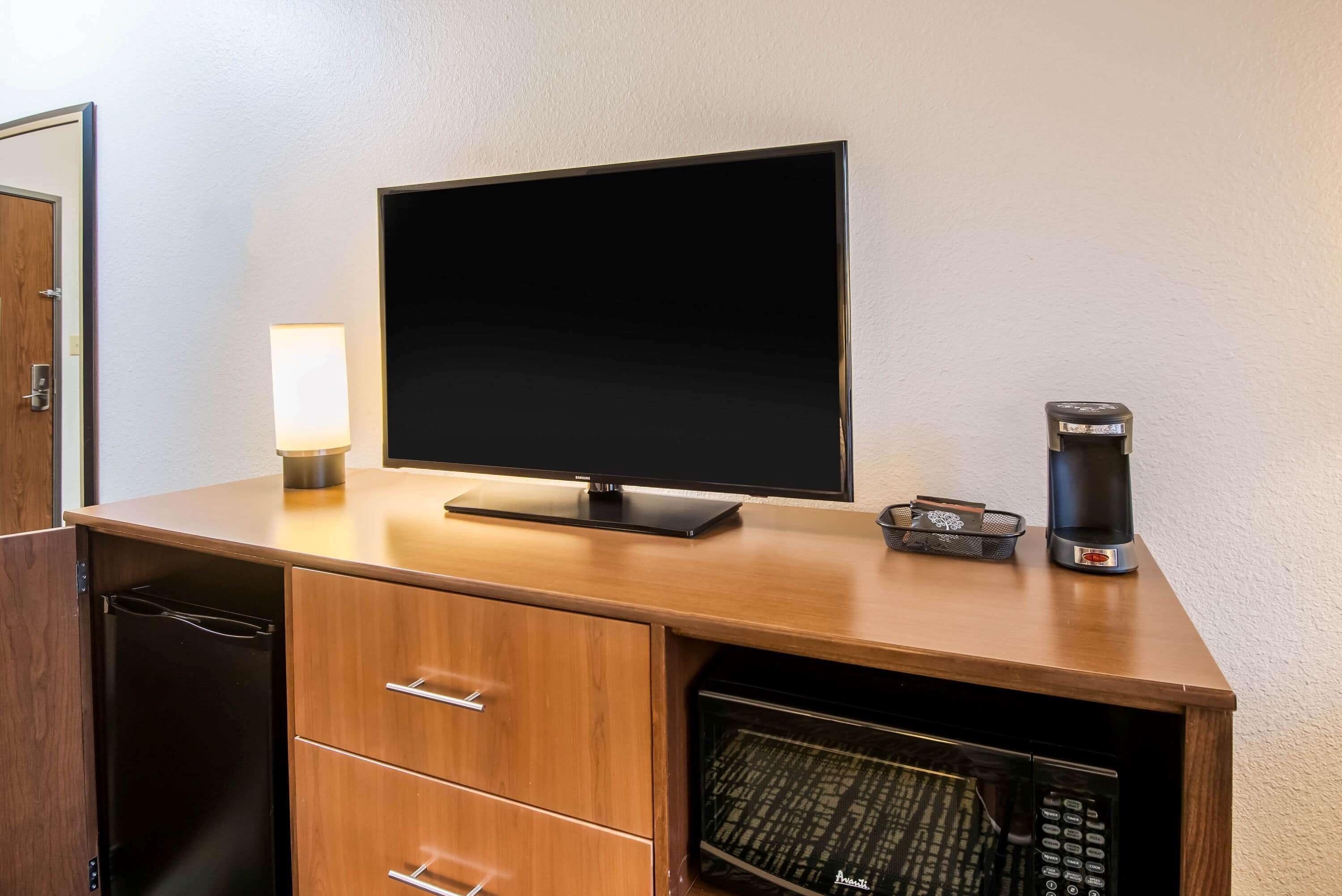 premium bedding, desk, blackout curtains, iron/ironing board