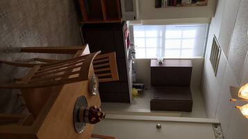 Full-size fridge, microwave, stovetop, coffee/tea maker
