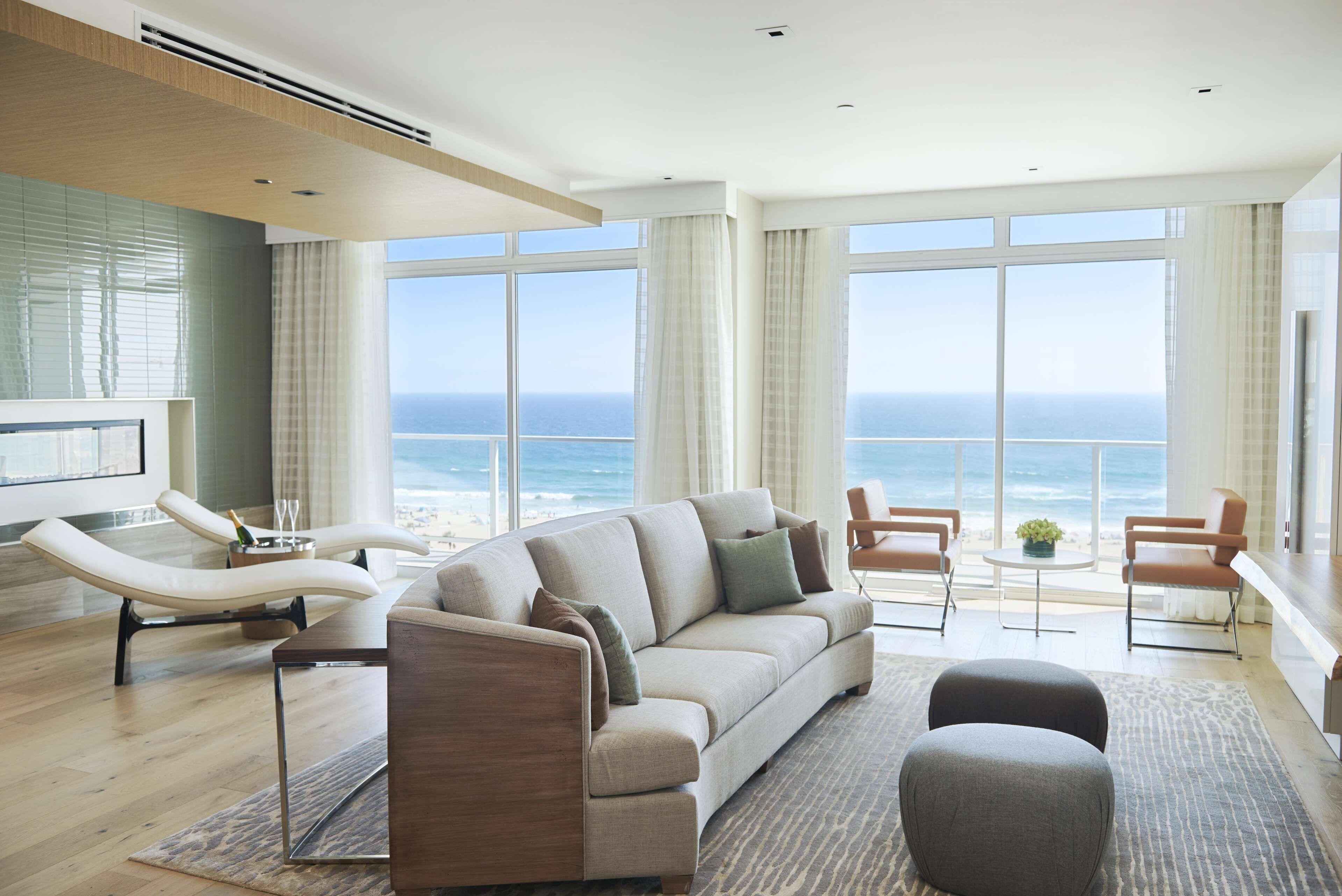 Penthouse (Ocean Front - With Balcony) | Living area | 48-inch TV with digital channels, iPod dock, pay films