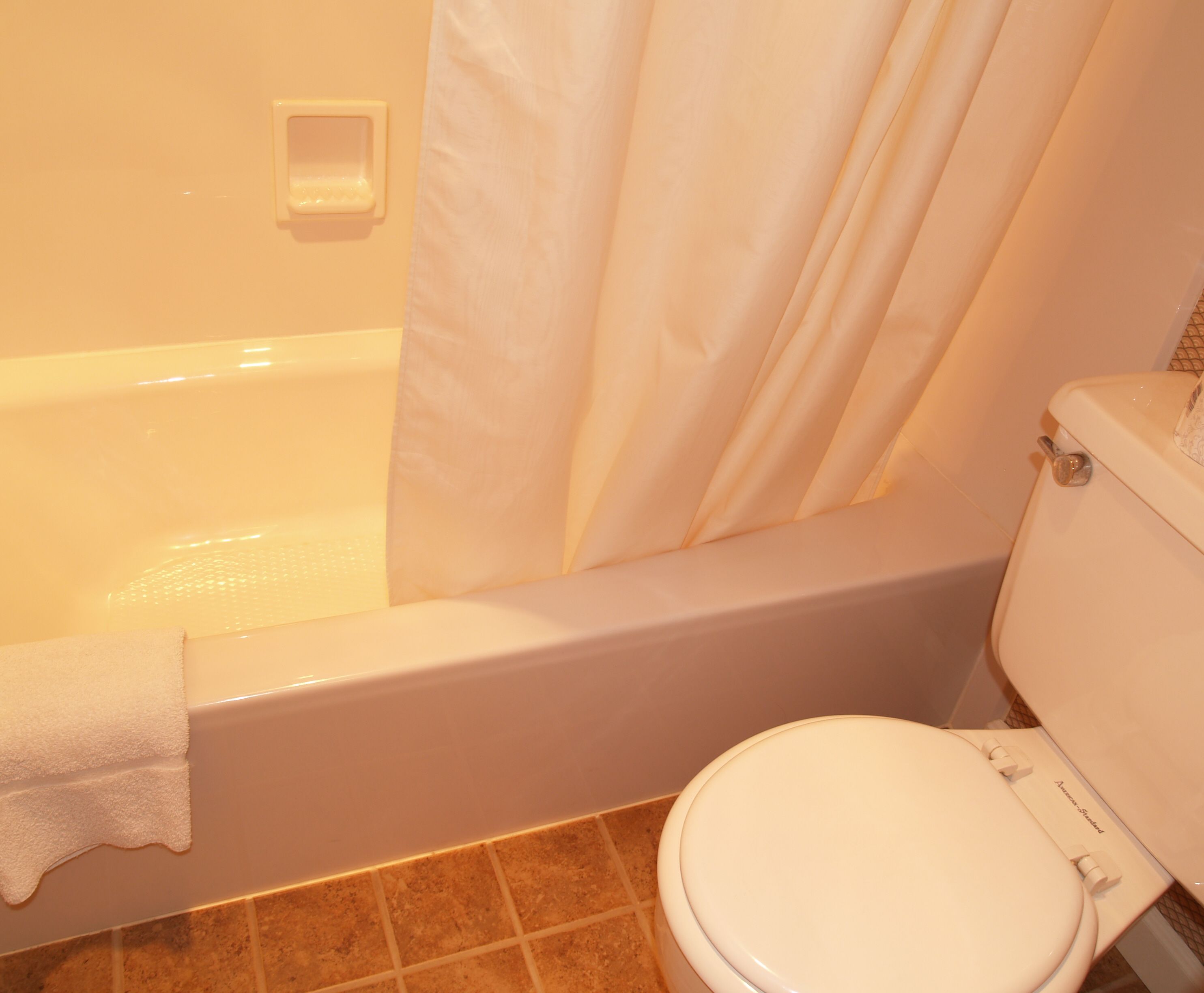 family room | bathroom | combined shower/bathtub, hair dryer, towels