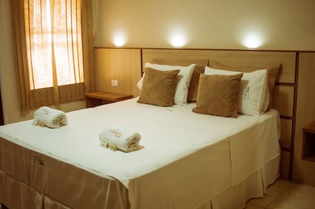 Deluxe Double or Twin Room | Minibar, in-room safe, individually decorated, cribs/infant beds