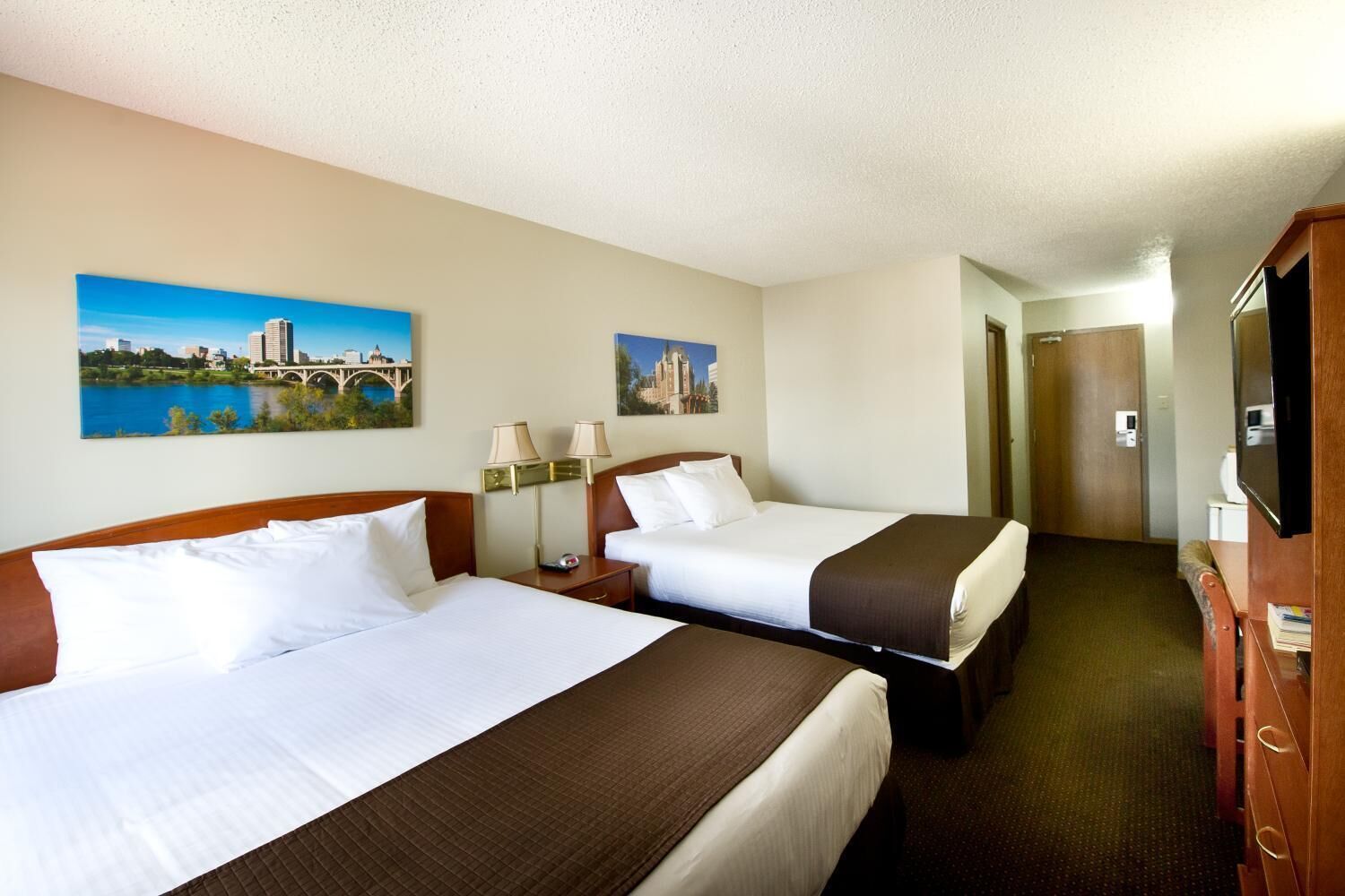 deluxe double room, 2 queen beds | desk, laptop workspace, blackout curtains, iron/ironing board