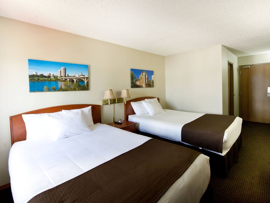 Deluxe Double Room, 2 Queen Beds | Desk, laptop workspace, blackout drapes, iron/ironing board