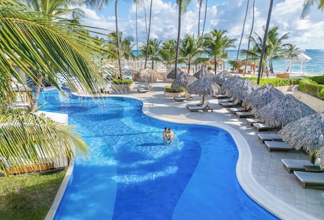 12 outdoor pools, open 8:00 AM to 6:00 PM, free cabanas, pool umbrellas