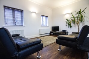 Signature Apartment, 1 Bedroom | Living area | 32-inch flat-screen TV with digital channels, TV, tablet - iStay - Perceval House (Northampton)