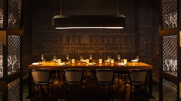 Enjoy meals in this dining area with a long table and six comfortable chairs.