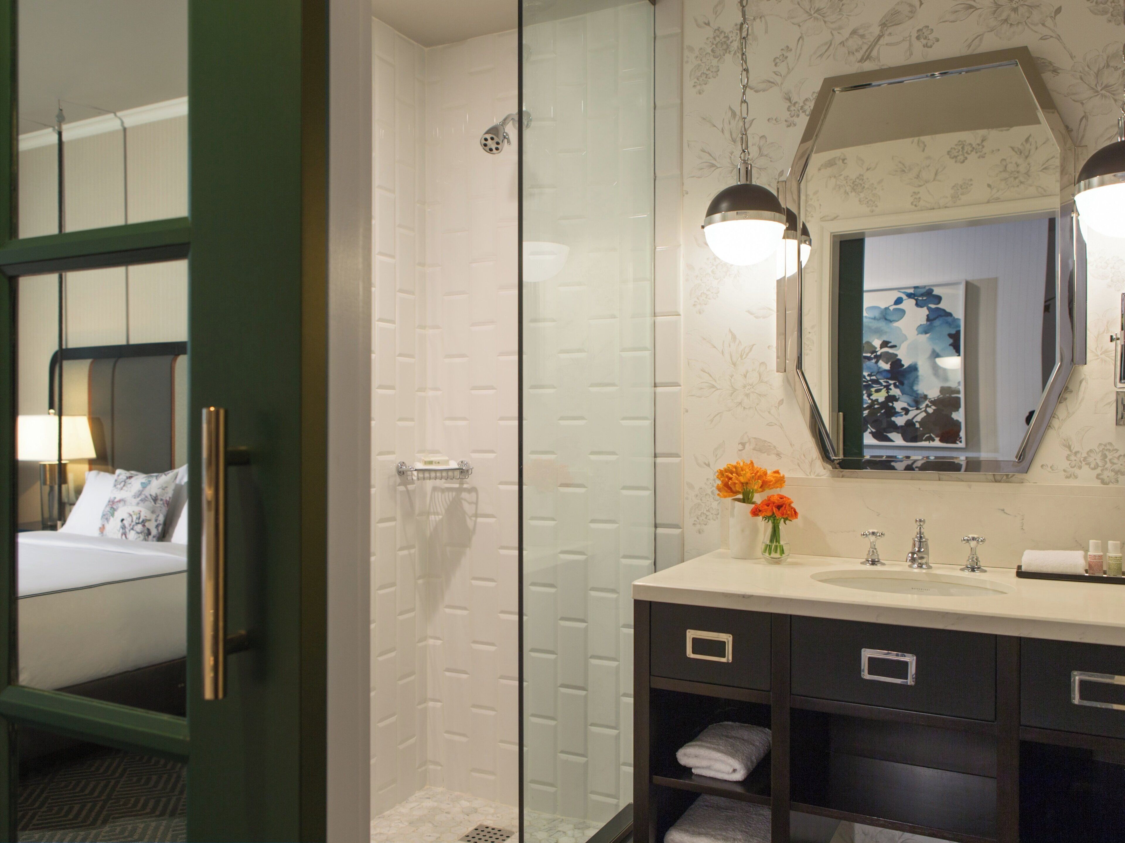 Designer toiletries, hair dryer, bathrobes, towels