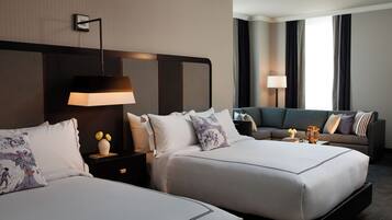 Premium bedding, down comforters, pillowtop beds, in-room safe