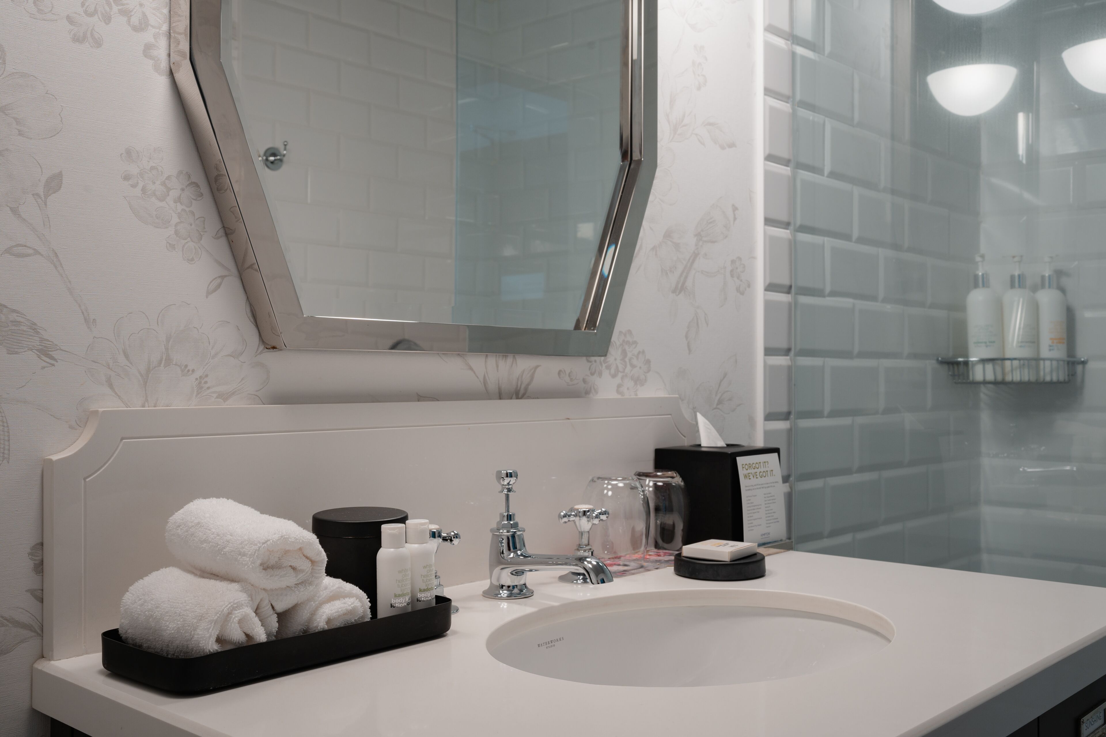 designer toiletries, hair dryer, bathrobes, towels