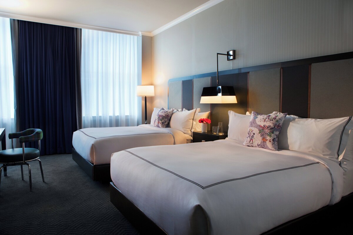 Premium bedding, down comforters, pillowtop beds, in-room safe