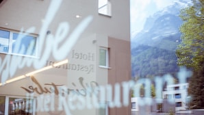 A hotel with a sign reading "Hotel Residenz". - Hotel Restaurant Weinstube (Eschen)