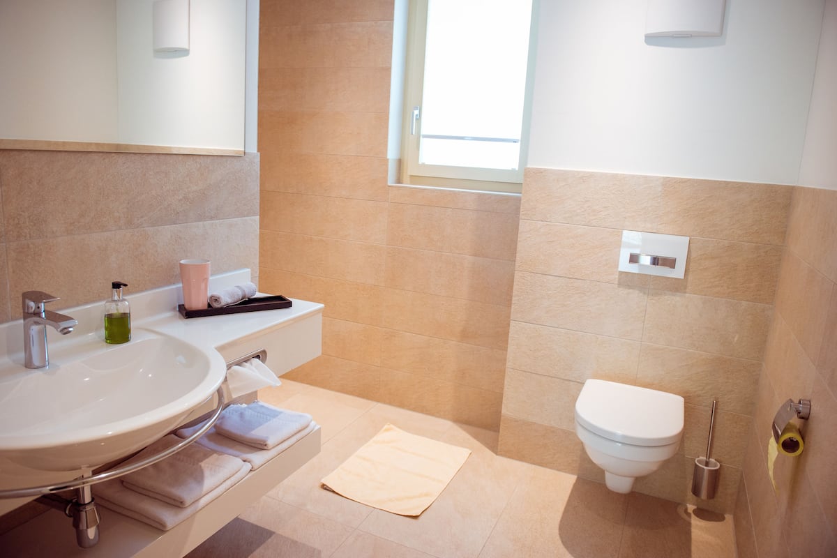 superior triple room | bathroom | hair dryer, towels, soap, shampoo