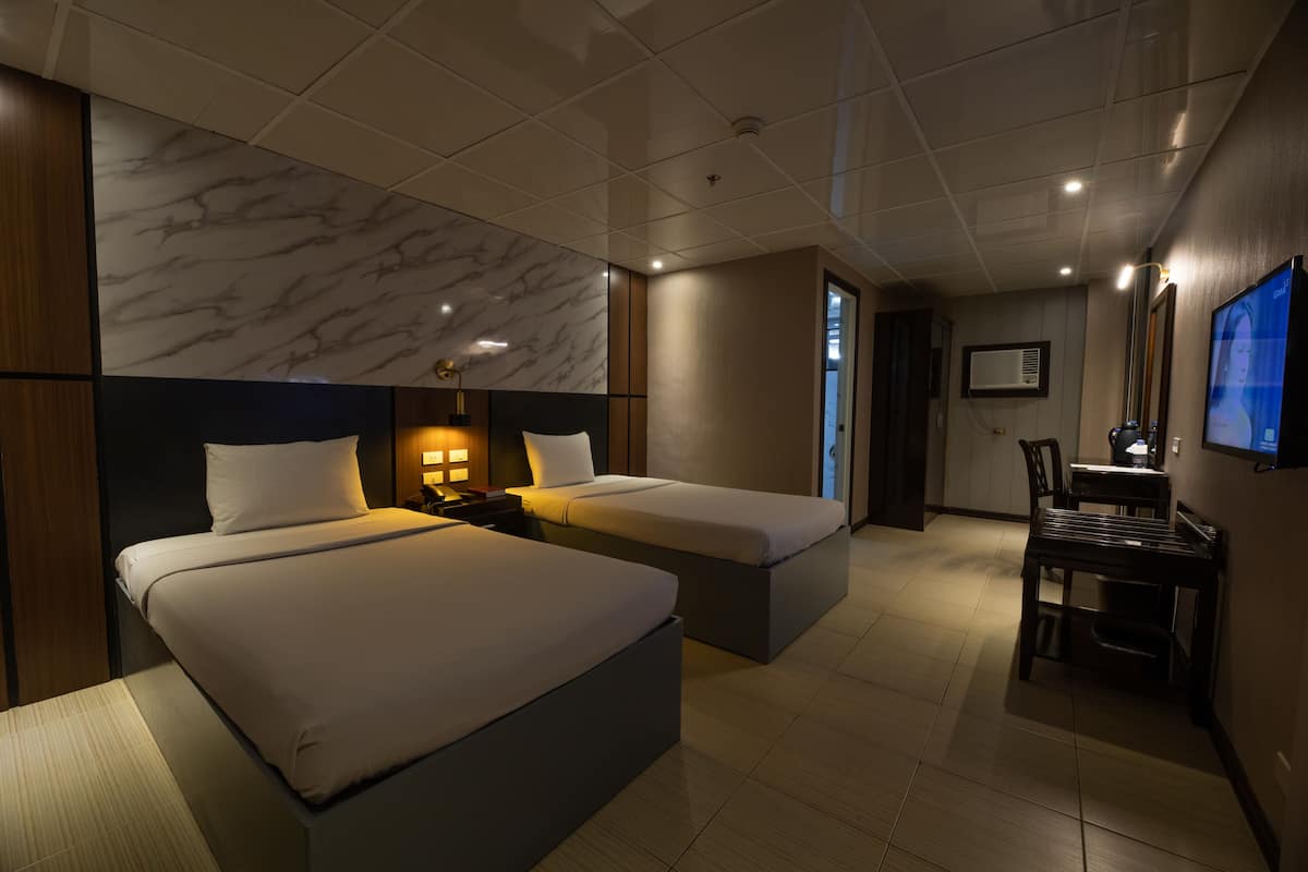 Junior Twin Room, 2 Twin Beds (No Window) | Desk, blackout drapes, free WiFi, bed sheets