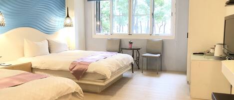 Chambre Quadruple Deluxe | Rideaux occultants, Wi-Fi gratuit, draps fournis