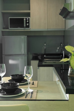 Chambre Deluxe | Cuisine privée | Réfrigérateur, cafetière/bouilloire, bouilloire électrique