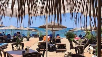 Breakfast, lunch, dinner served; Greek cuisine, beach views