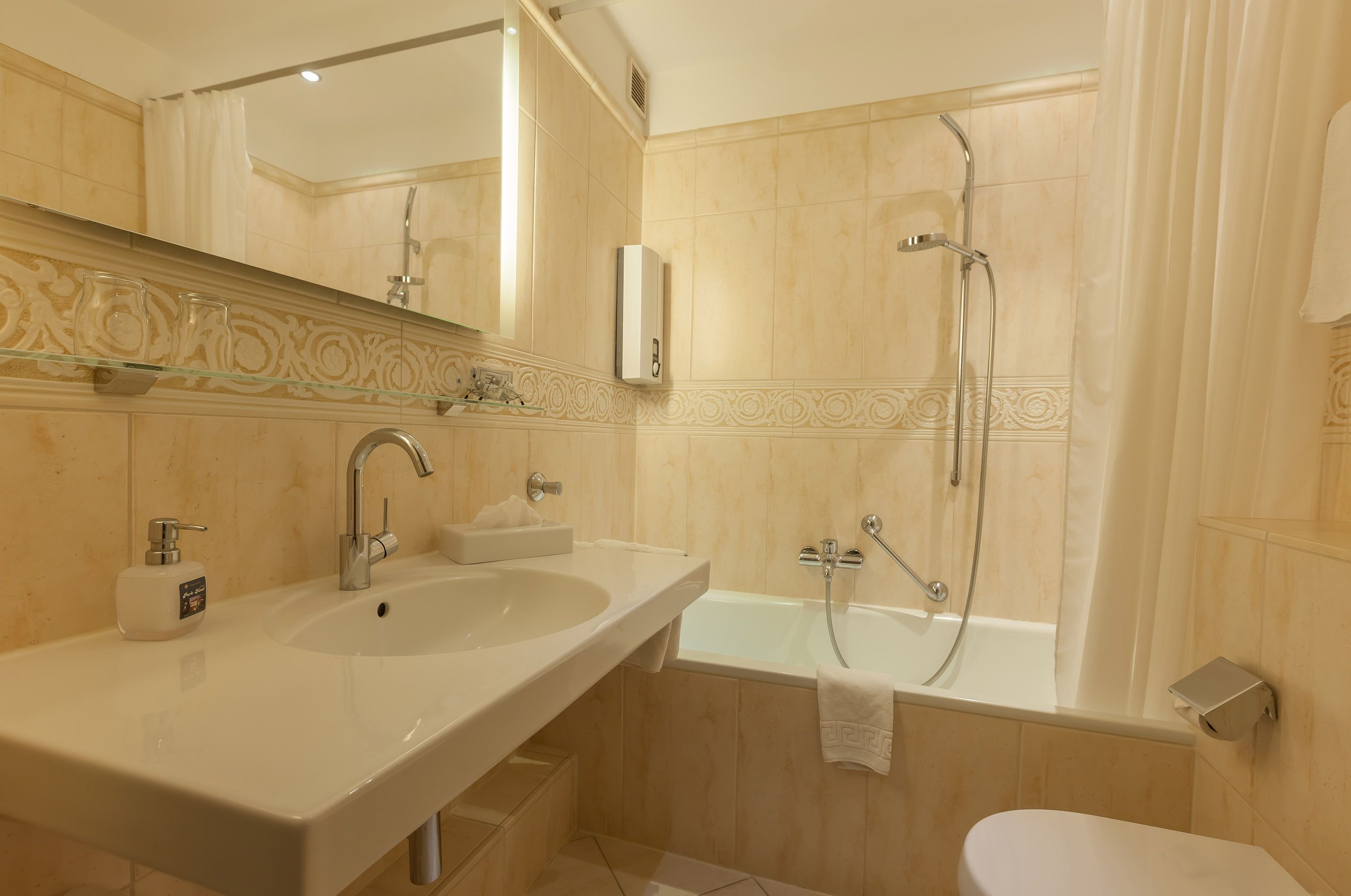 deluxe double room | bathroom | free toiletries, hair dryer, towels
