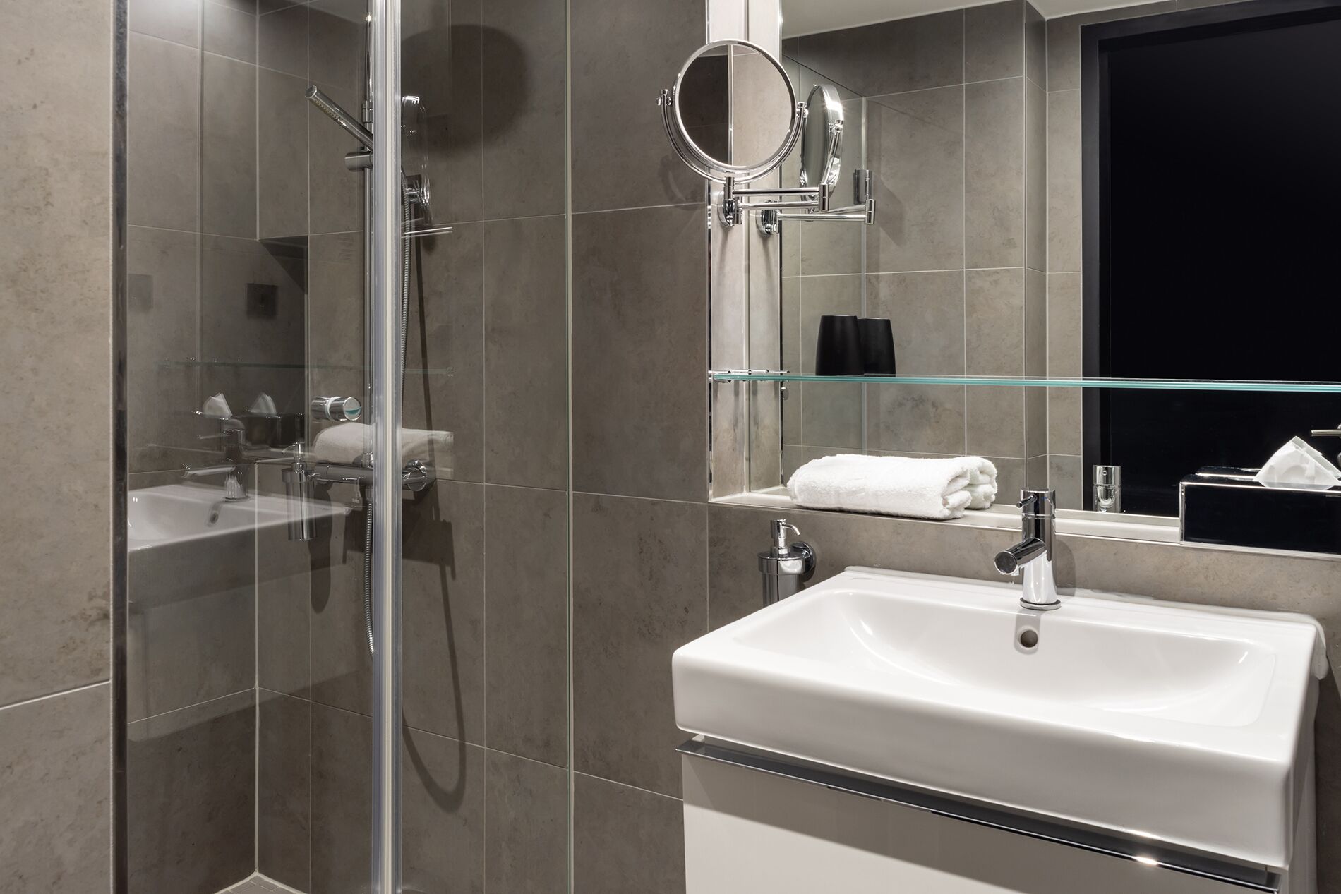 economy single room | bathroom | shower, hair dryer, towels