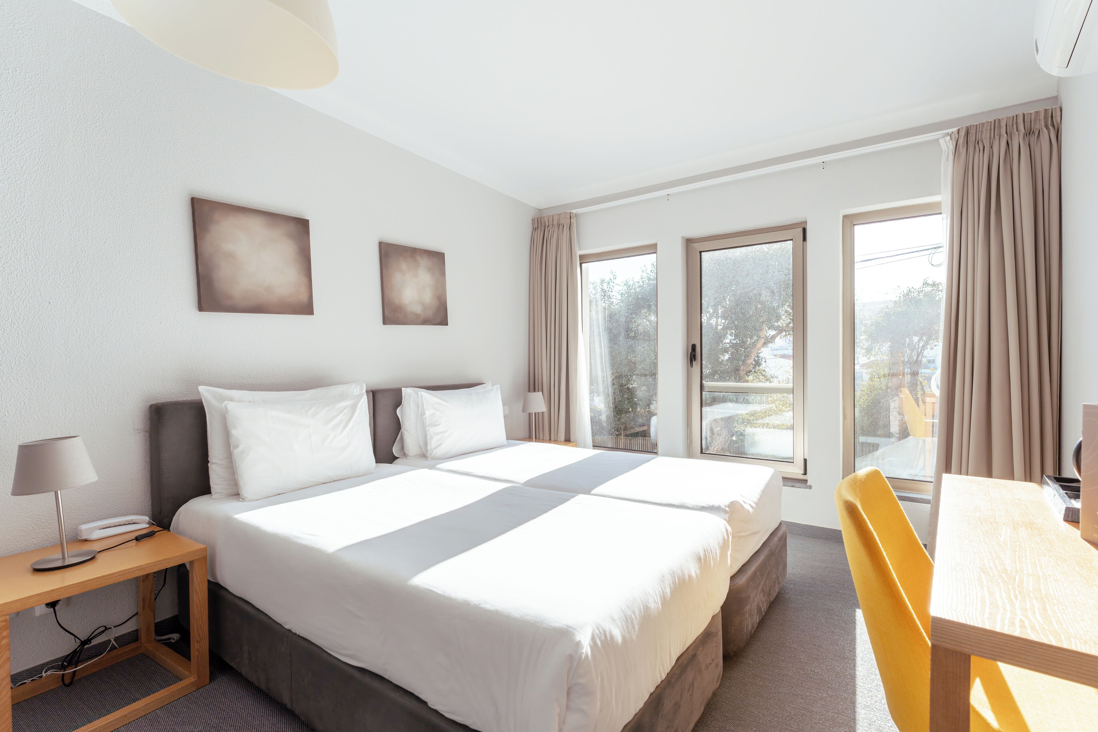 senior twin room, 2 single beds, accessible | 1 bedroom, individually decorated, individually furnished, desk