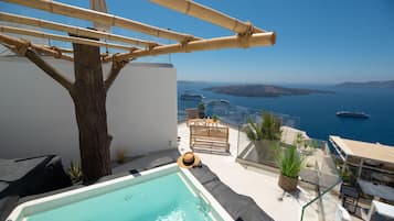 Suite junior, hidromasaje, vista al mar | Baño | Regadera, amenidades de baño gratuitas, secadora de cabello, batas