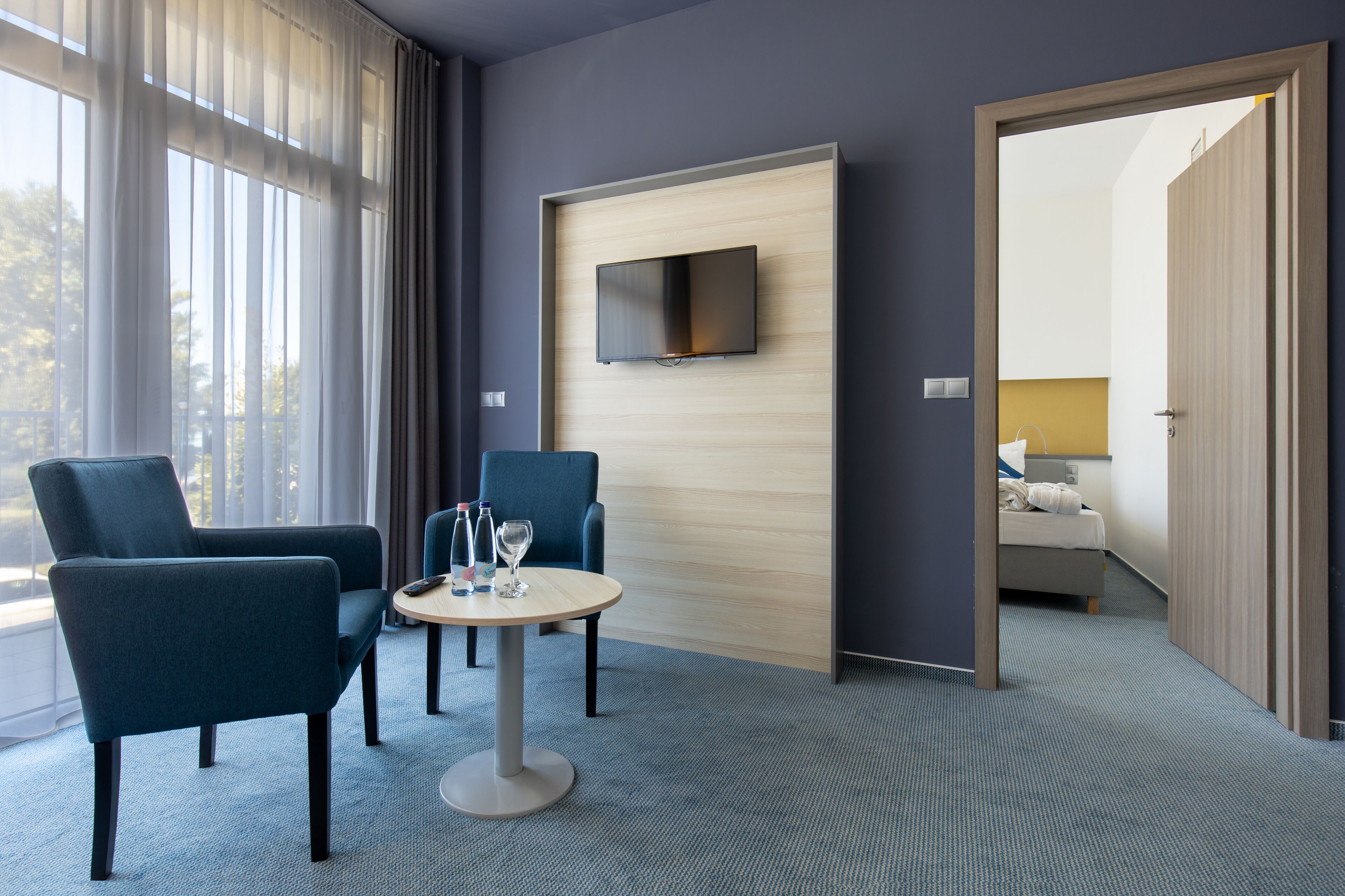 suite, 1 double bed with sofa bed | minibar, in-room safe, desk, blackout curtains