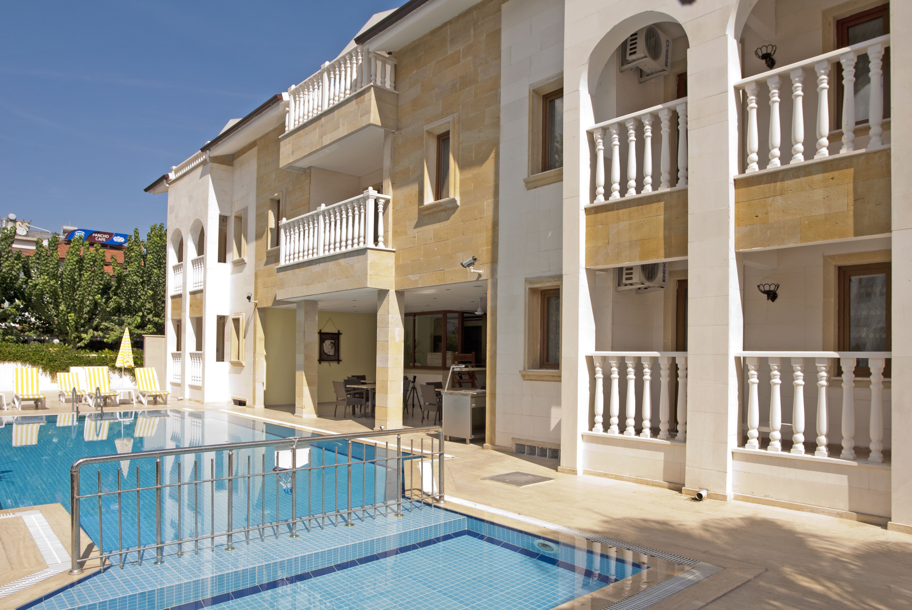 Outdoor pool, open 7:00 AM to 7:00 PM, pool umbrellas, sun loungers