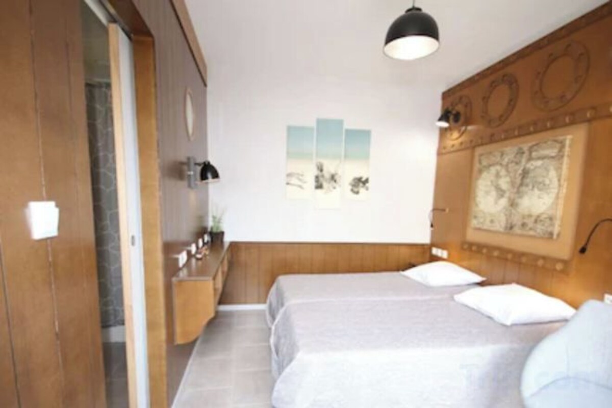 Desk, iron/ironing board (on request), free WiFi, bed sheets