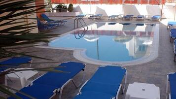 Outdoor pool, pool umbrellas, pool loungers