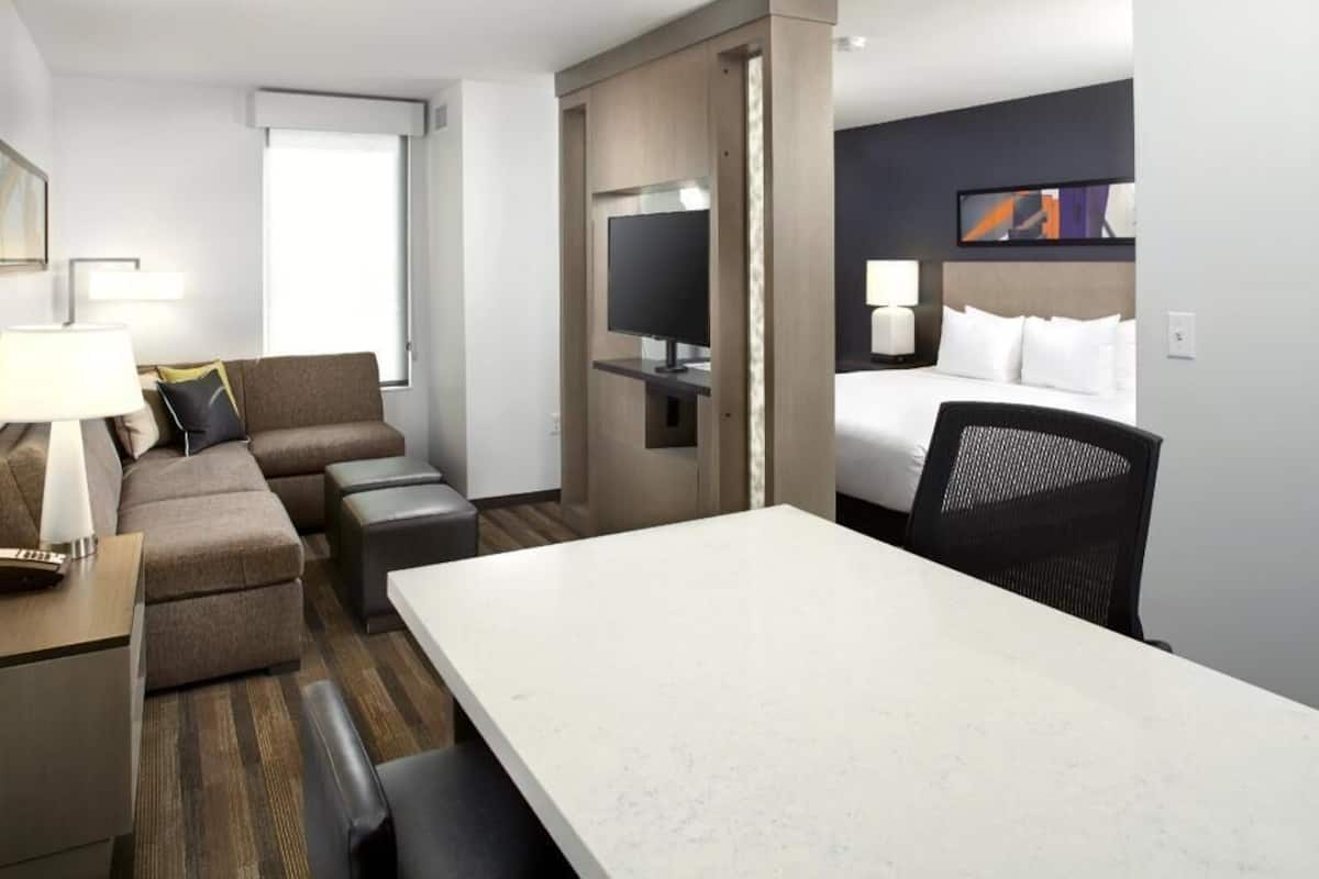 Premium bedding, desk, blackout drapes, iron/ironing board