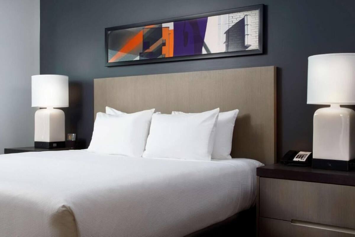 Premium bedding, desk, blackout drapes, iron/ironing board