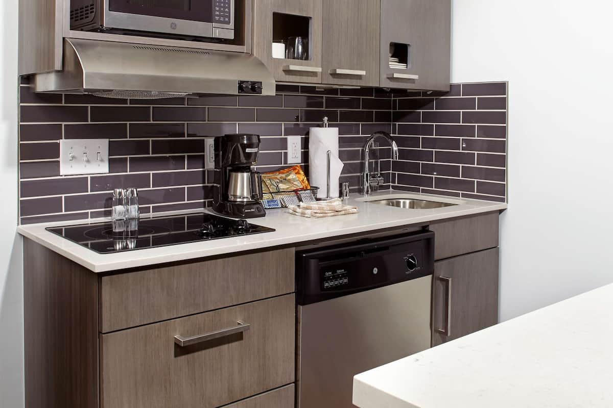 premium bedding, desk, blackout curtains, iron/ironing board