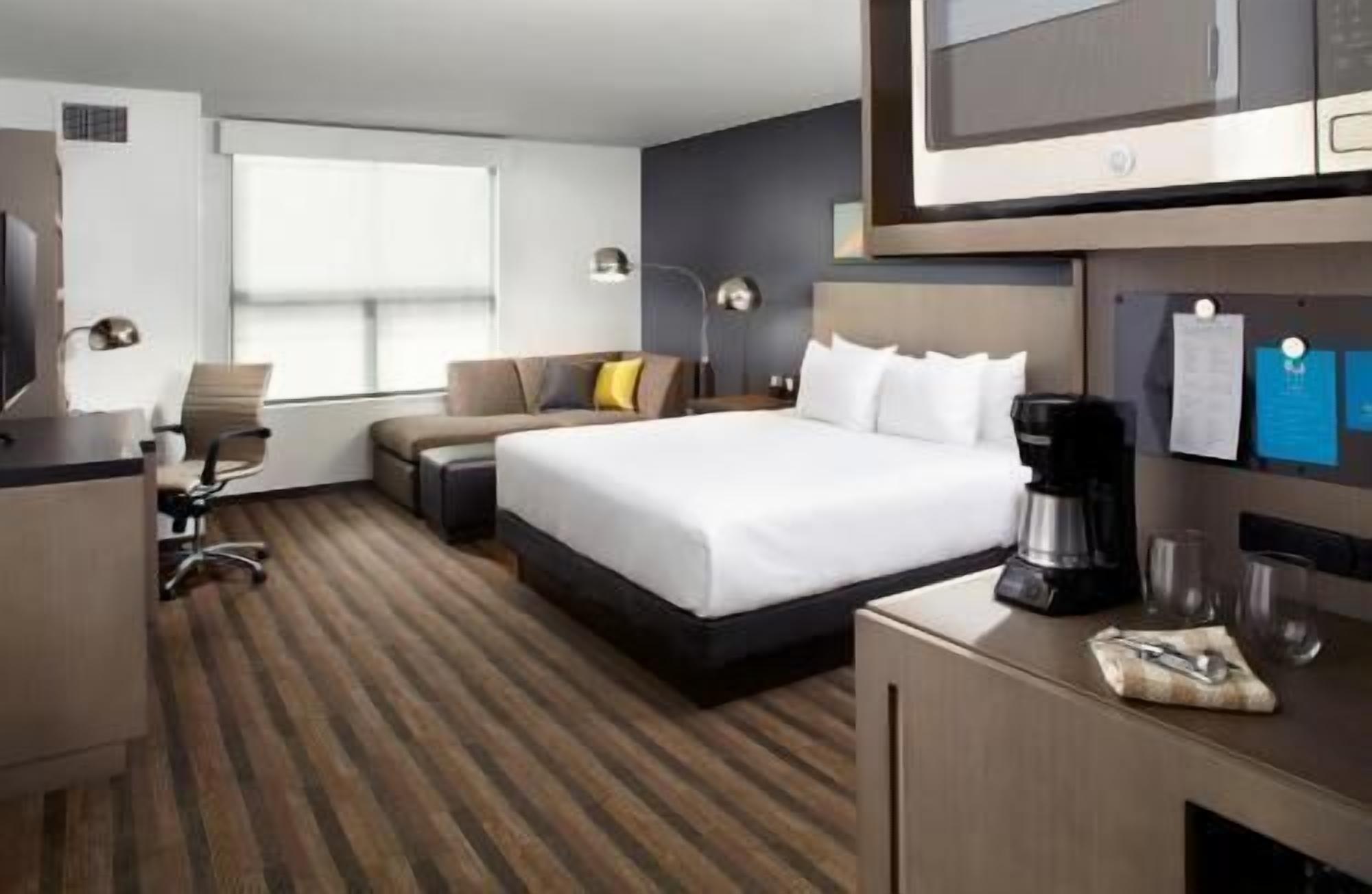 Premium bedding, desk, blackout drapes, iron/ironing board