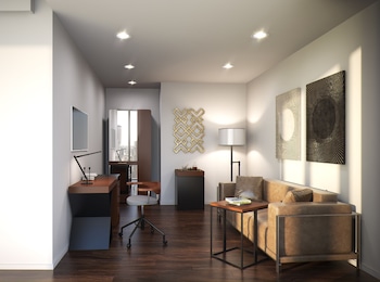 Premium bedding, minibar, in-room safe, desk at Thompson Seattle, by Hyatt