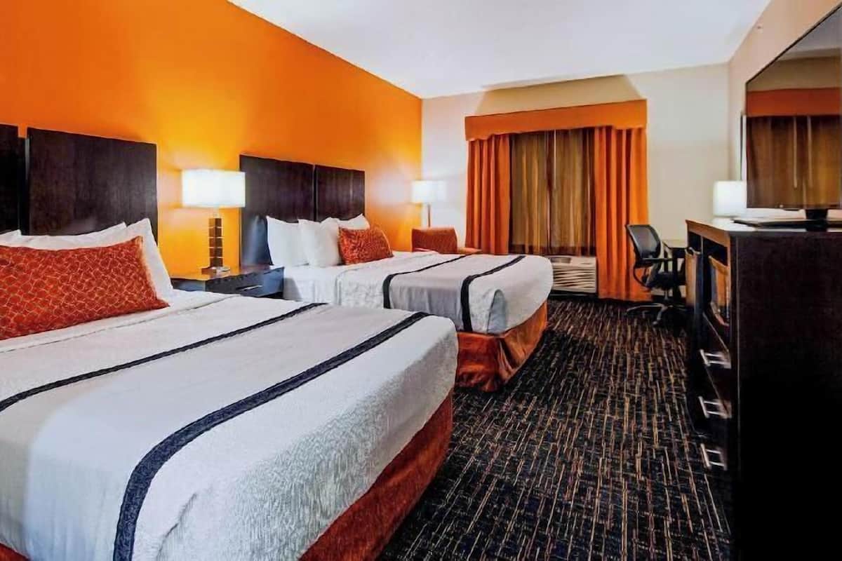 Premium bedding, desk, iron/ironing board, rollaway beds