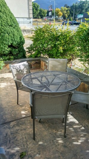 Elite Suite, 1 King Bed, Accessible, Fireplace | Terrace/patio - Falls Motel (Thompson Falls)
