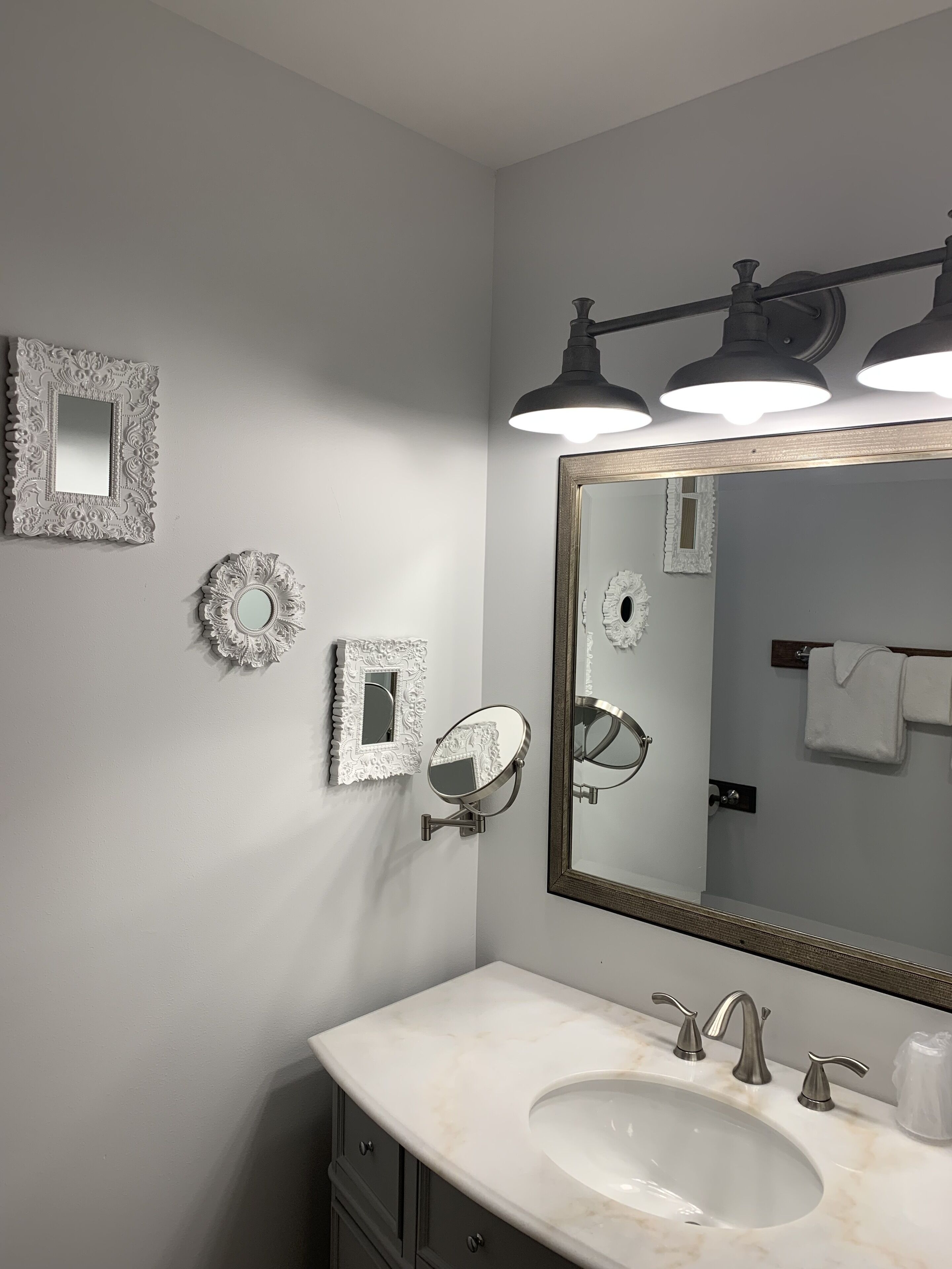 signature room, 1 king bed | bathroom sink