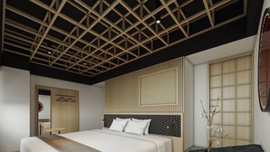 A modern bedroom with a large bed, a bedside table, a vase with branches, and a wooden ceiling design. - Fujinomiya Fujikyu Hotel (Fujinomiya)