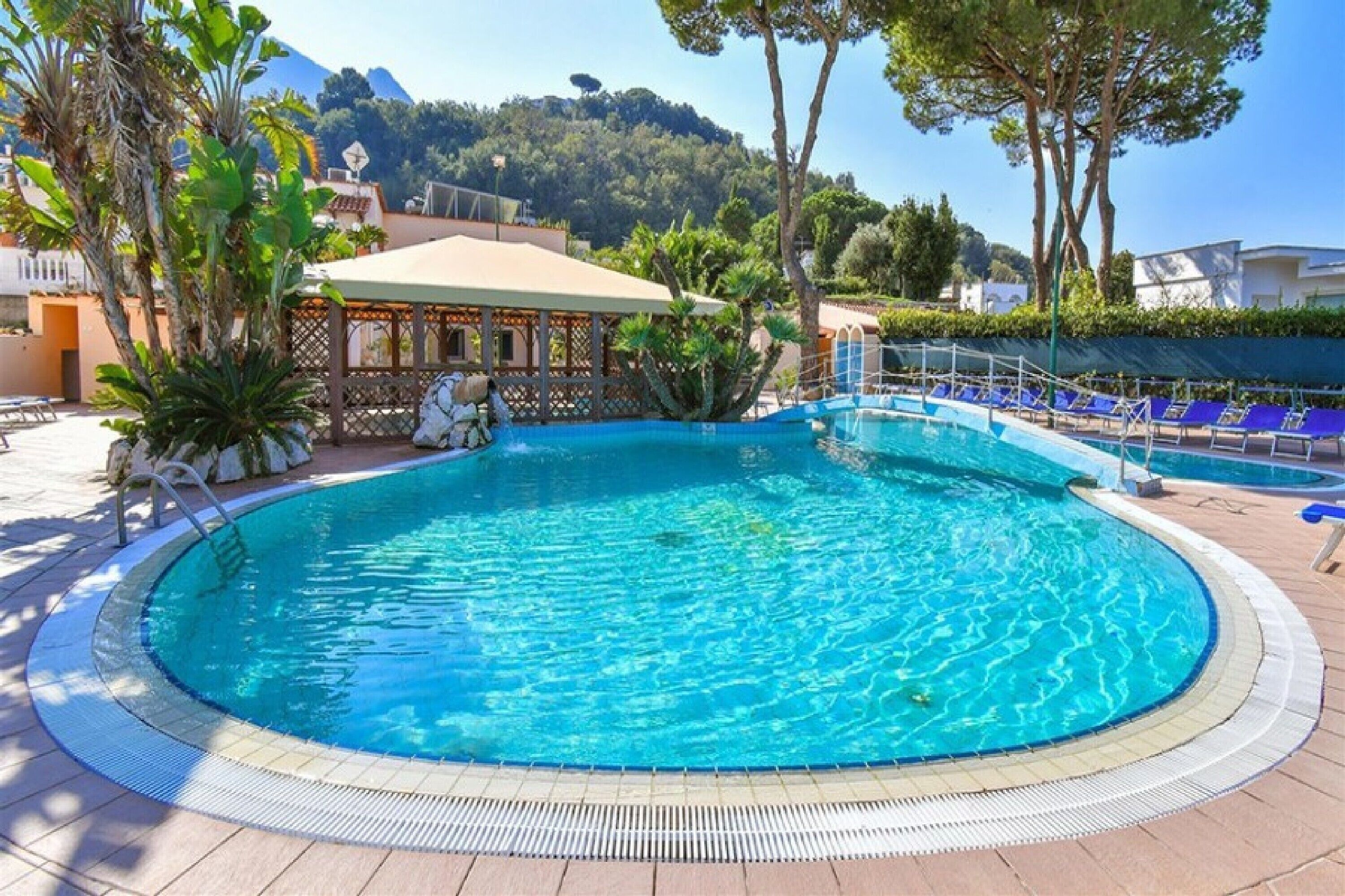 Indoor pool, 2 outdoor pools, open 8:00 AM to 7:00 PM, pool umbrellas