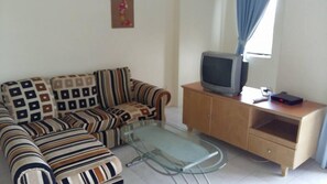 Studio – deluxe | Oppholdsrom | Flatskjerm-TV