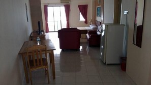 Studio – deluxe | Oppholdsrom | Flatskjerm-TV