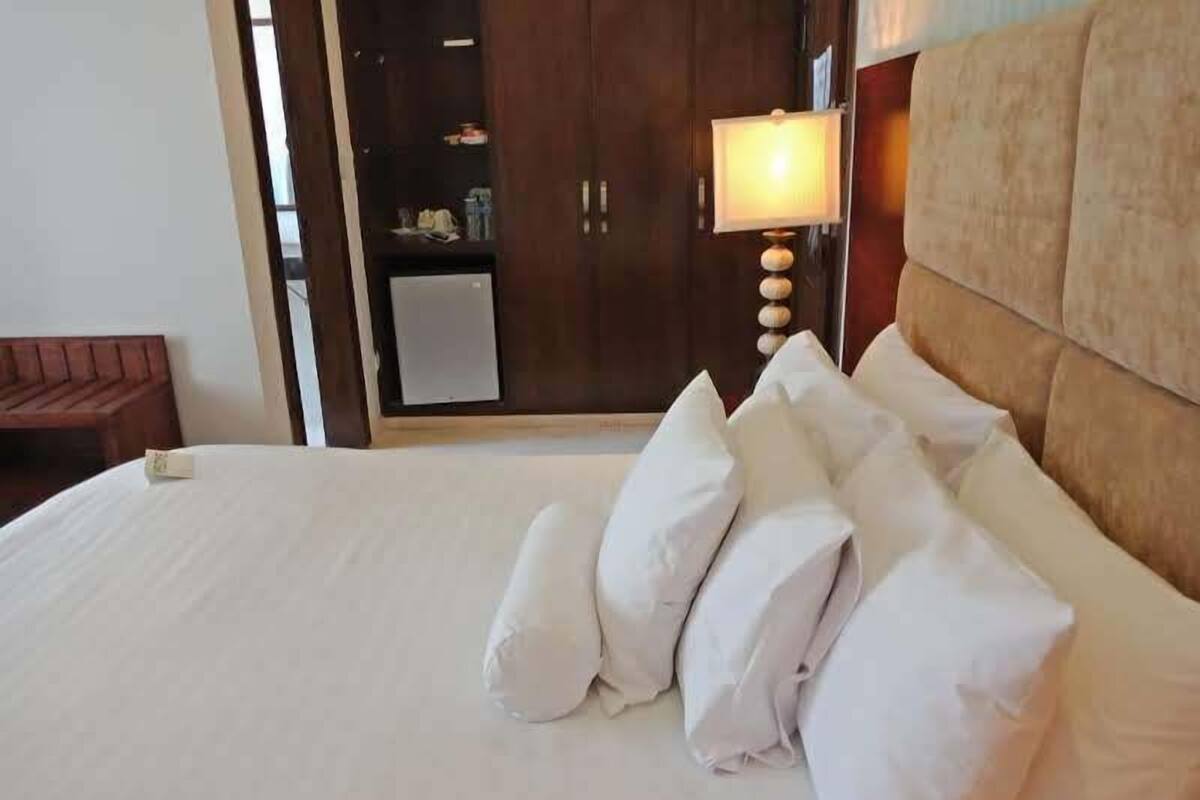 Habitación ejecutiva | Ropa de cama de alta calidad, camas con pillow-top y minibar 