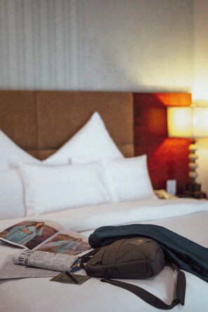 Ropa de cama de alta calidad, colchones con pillow-top y minibar 