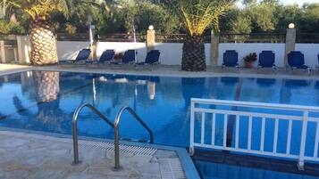 Outdoor pool, pool umbrellas, pool loungers