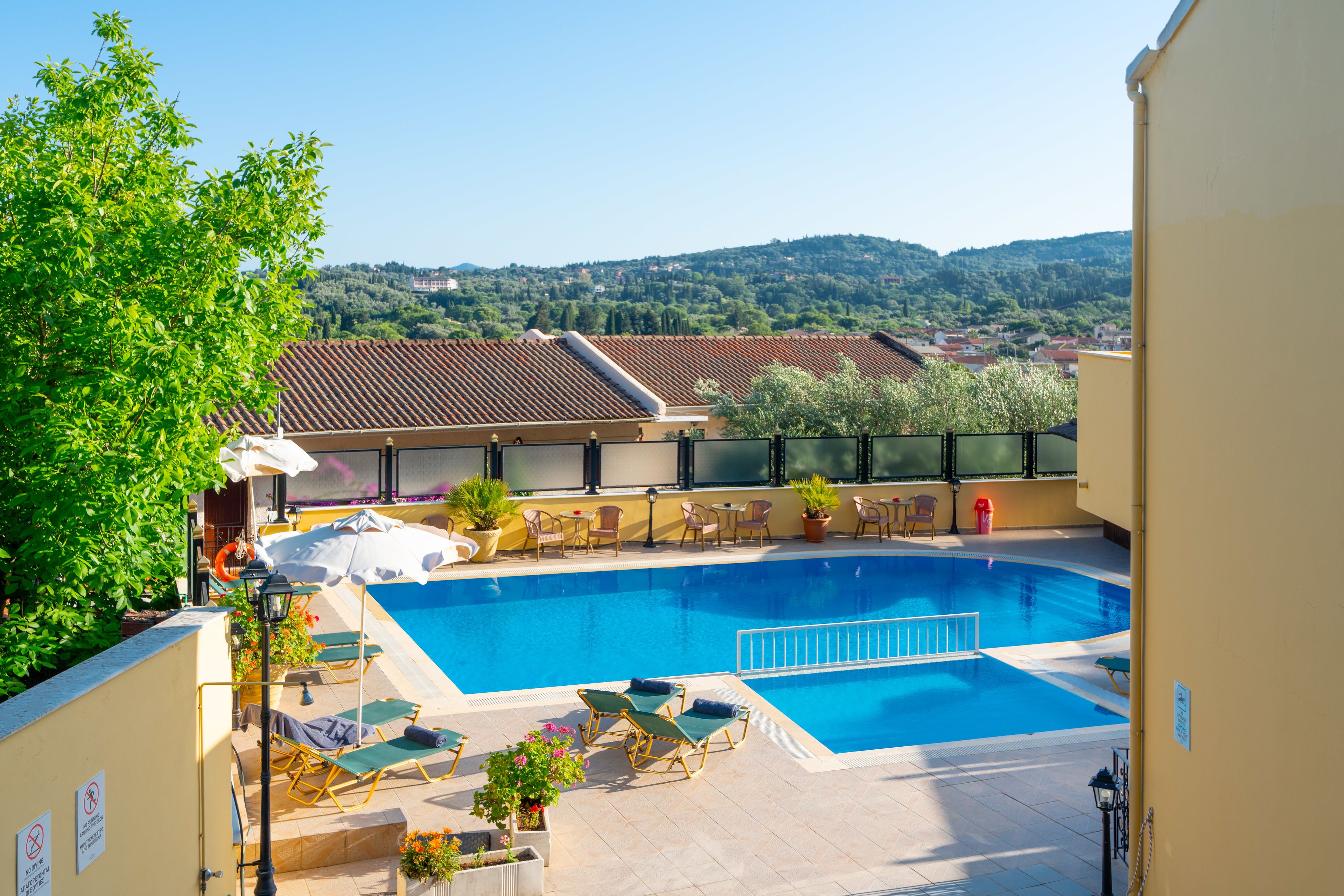 Seasonal outdoor pool, pool umbrellas, sun loungers