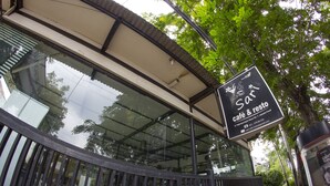 A cafe & resto with a glass enclosure and a signboard. - House of Arsonia Bougainvillea (Jakarta)
